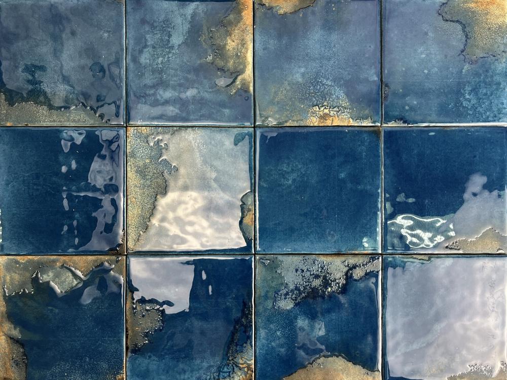 Patterned tiles with blue and gold colors