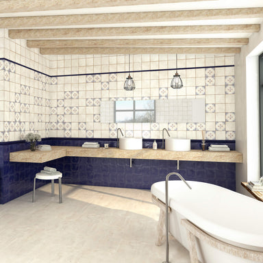 Modern bathroom with tiled walls, a bathtub, and vanity area.